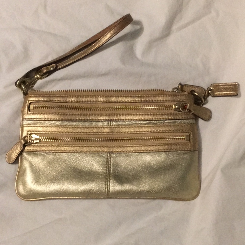 Coach gold wristlet